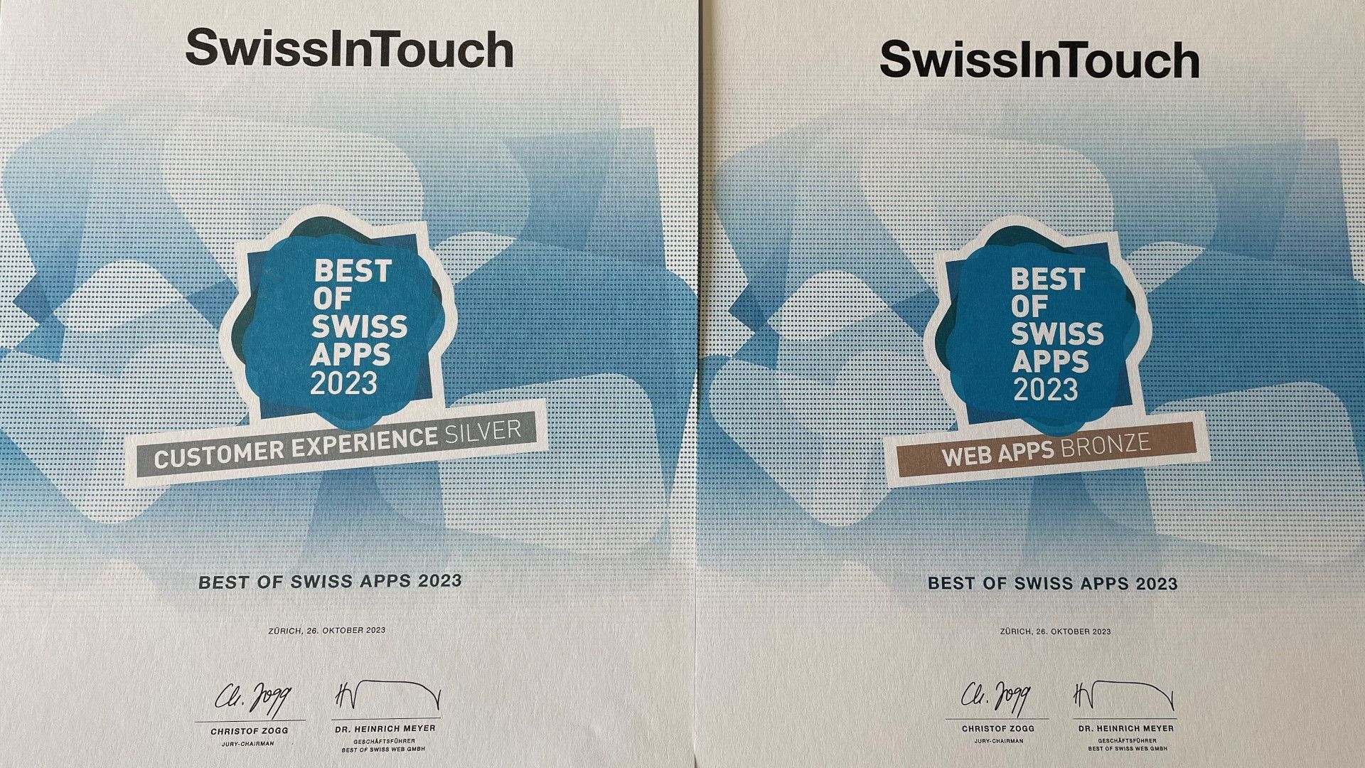 The picture shows the two awards silver and bronze at the Best of Swiss Apps Awards 2023.